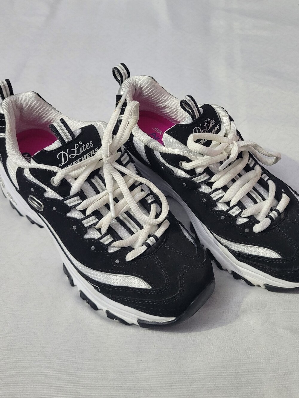Skechers D'Lites Women's Black and White Sneakers with Pink Lining